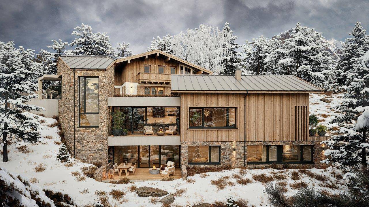 Eindrucksvolle Frontansicht eines modernen Chalets mit Stein- und Holzfassade und großen Glasflächen im Schnee.