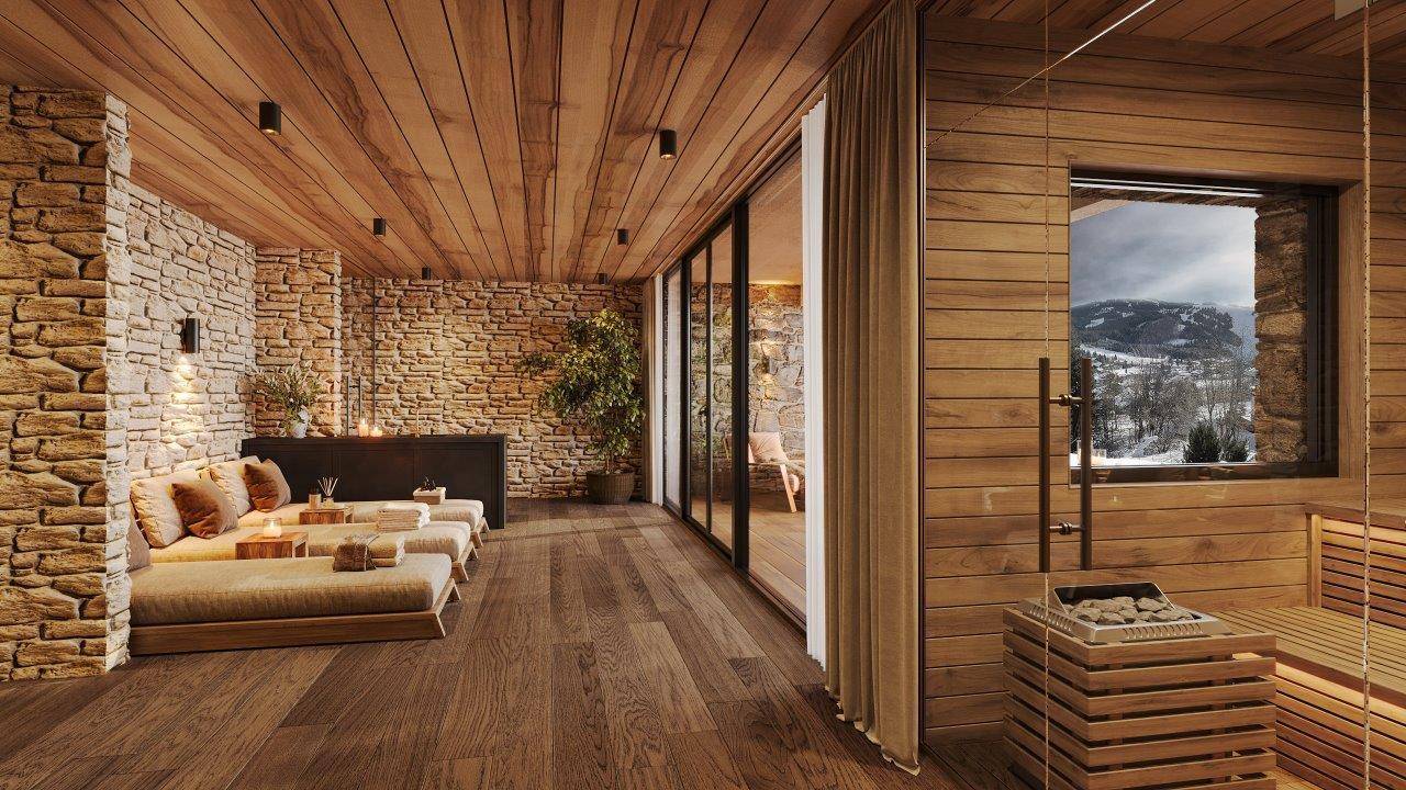 Exklusiver Wellnessbereich mit Sauna, Steinwänden, Holzverkleidung und Liegeflächen für pure Entspannung.