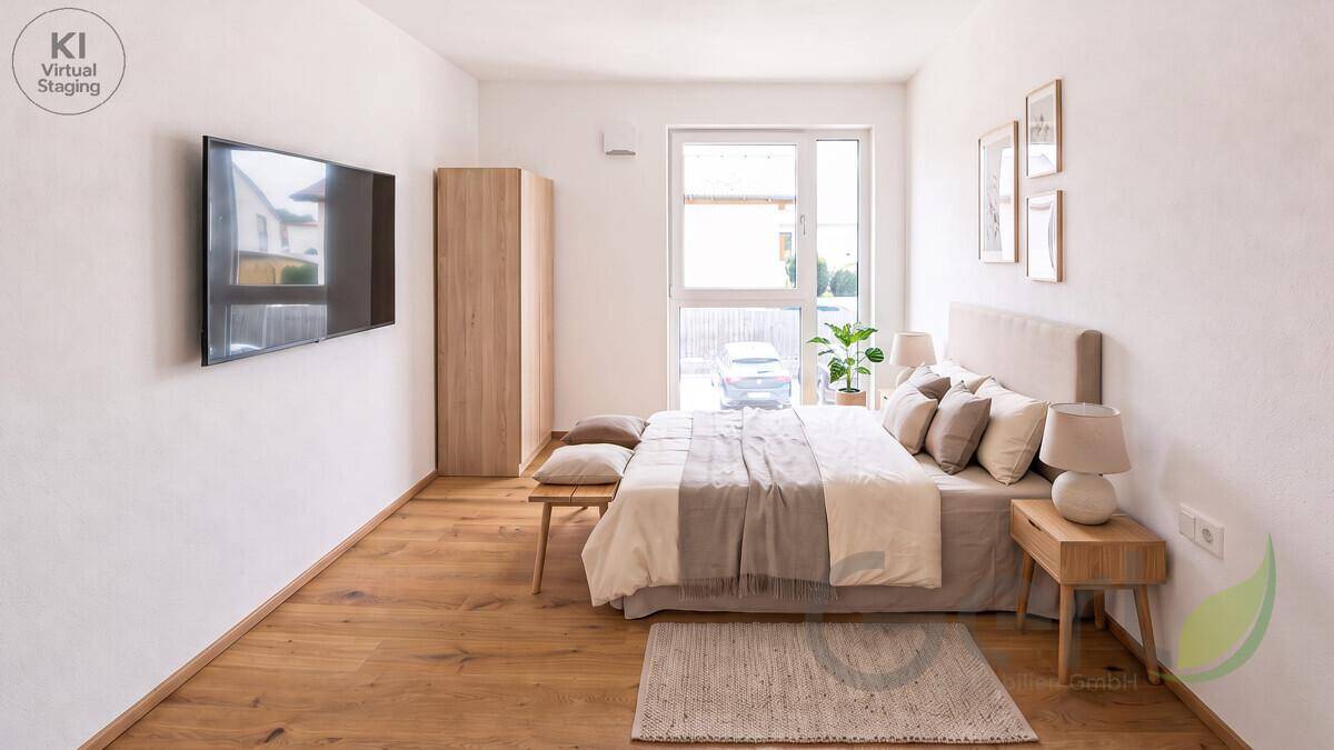 Modern eingerichtetes Schlafzimmer mit Holzboden, großem Fenster und Zugang zum Außenbereich.