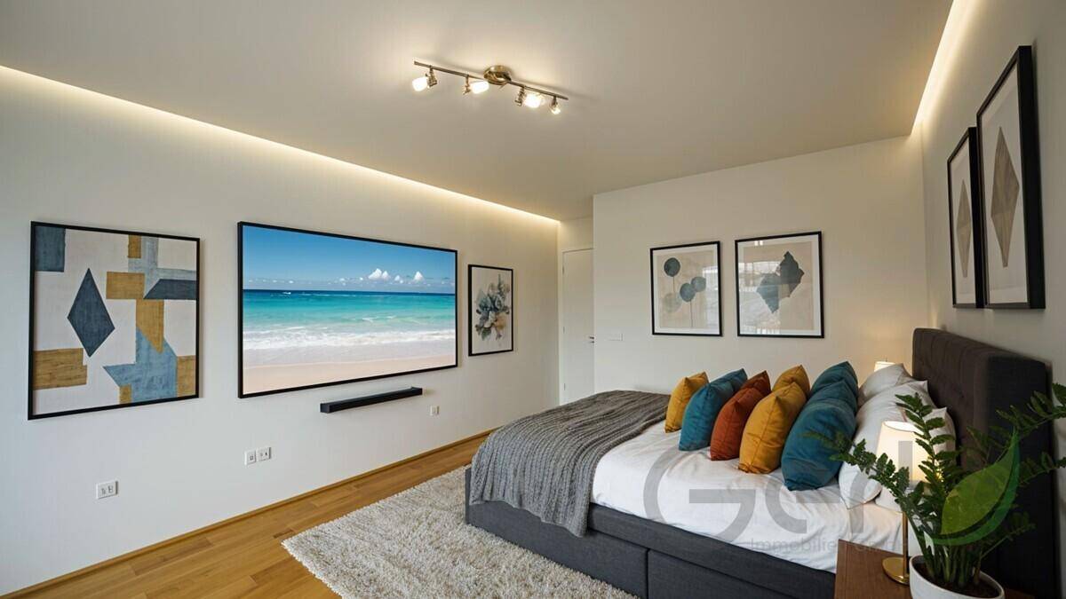 Modernes Schlafzimmer mit großem Bett, integriertem Fernseher und indirekter Beleuchtung für eine gemütliche Atmosphäre.