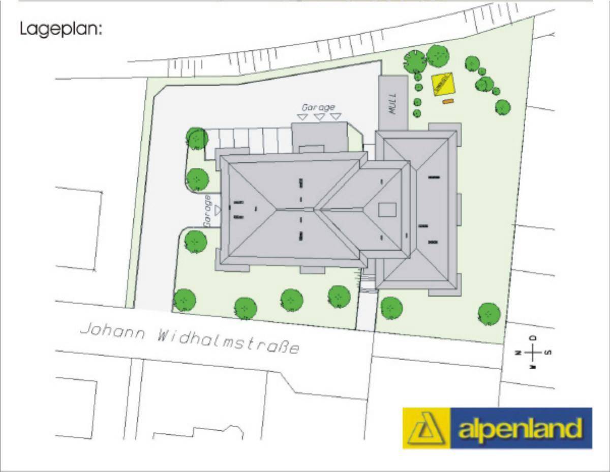 Lageplan des Wohnhauses mit eingezeichneten Parkplätzen, Garagen, Grünflächen und einem Spielplatz.
