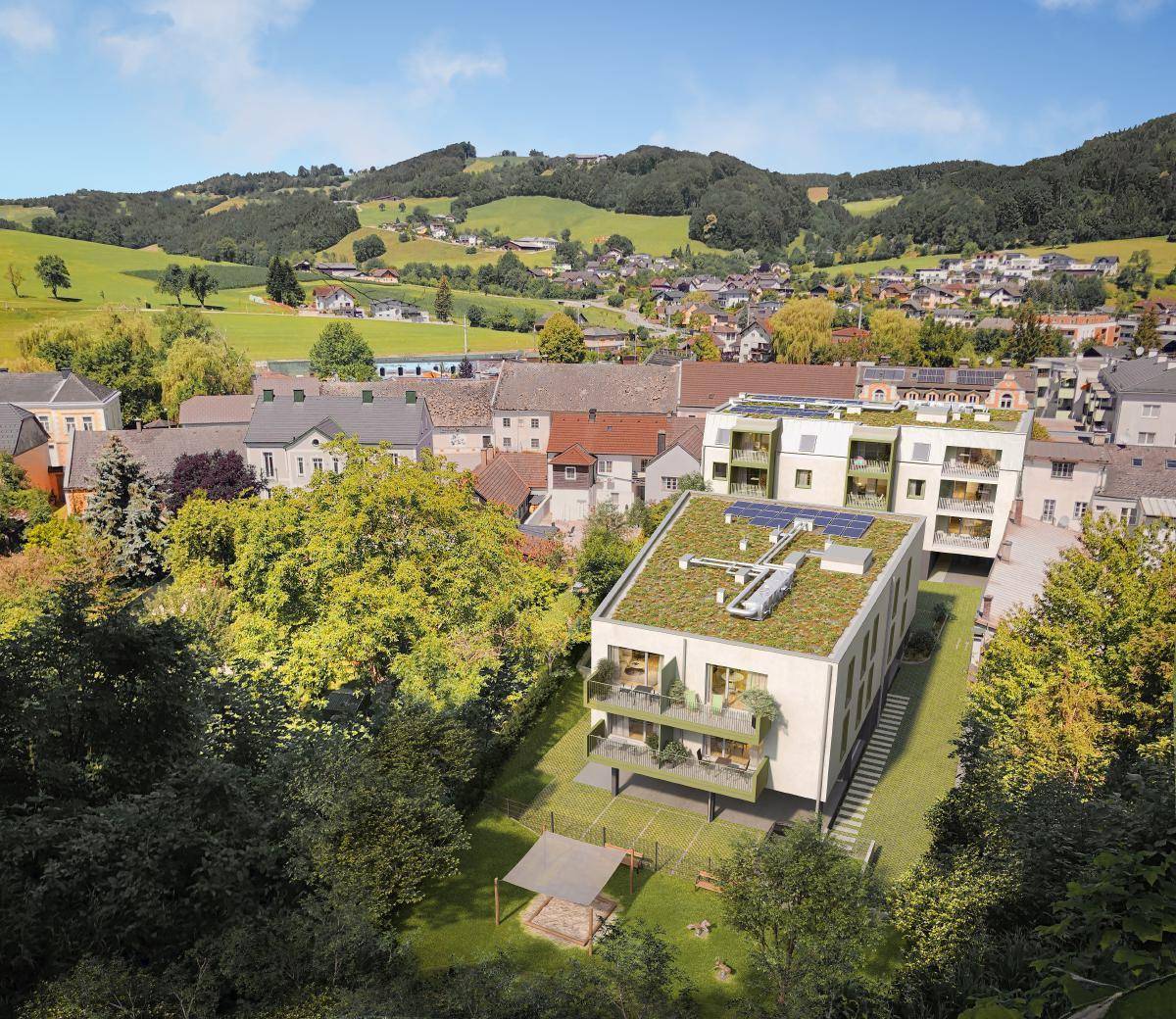 Visualisierung eines modernen Neubaus mit Gründach und Photovoltaikanlage in ländlicher Umgebung.
