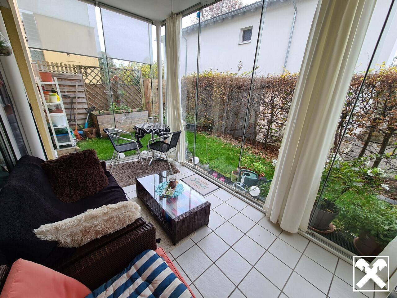 Verglaste Terrasse mit Privatgarten