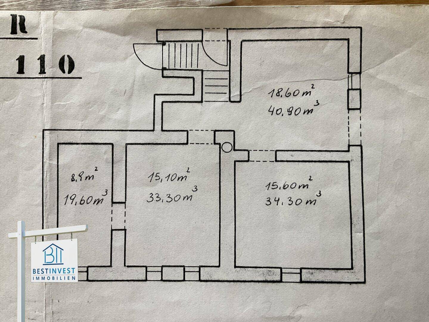 Grundriss mit Raumaufteilung und Flächenangaben in Quadrat- und Kubikmetern.
