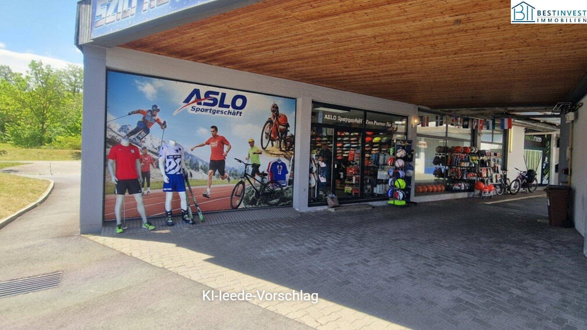 Außenansicht eines Gebäudeteils mit einer großen Werbetafel für "ASLO Sportgeschäft" und einem überdachten Eingangsbereich.