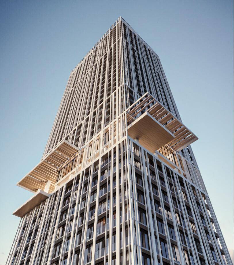 Moderne Hochhausfassade mit vertikalen Elementen und auskragenden Balkonen unter blauem Himmel.