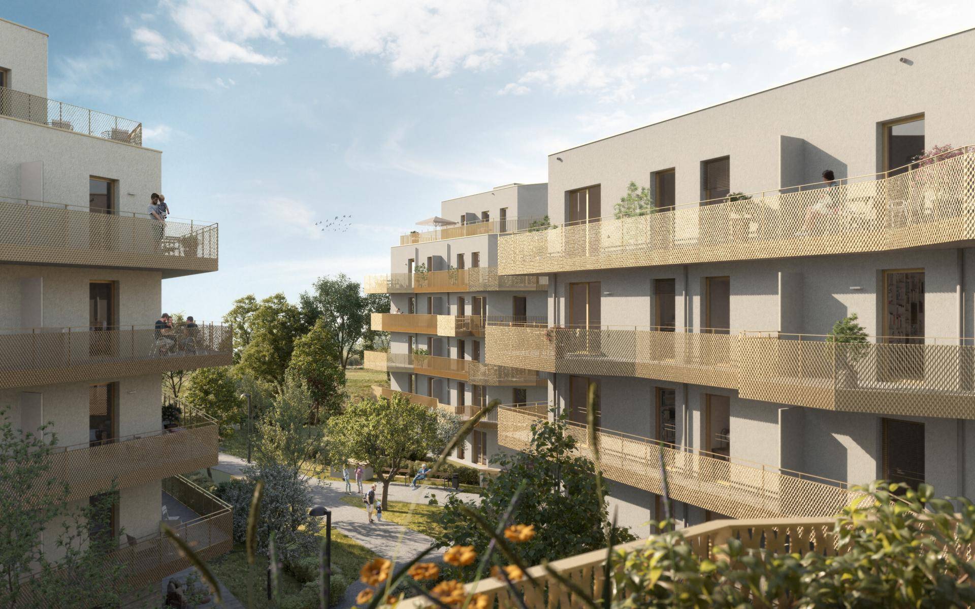 Moderne Wohngebäude mit goldenen Balkongeländern und grünen Außenbereichen.