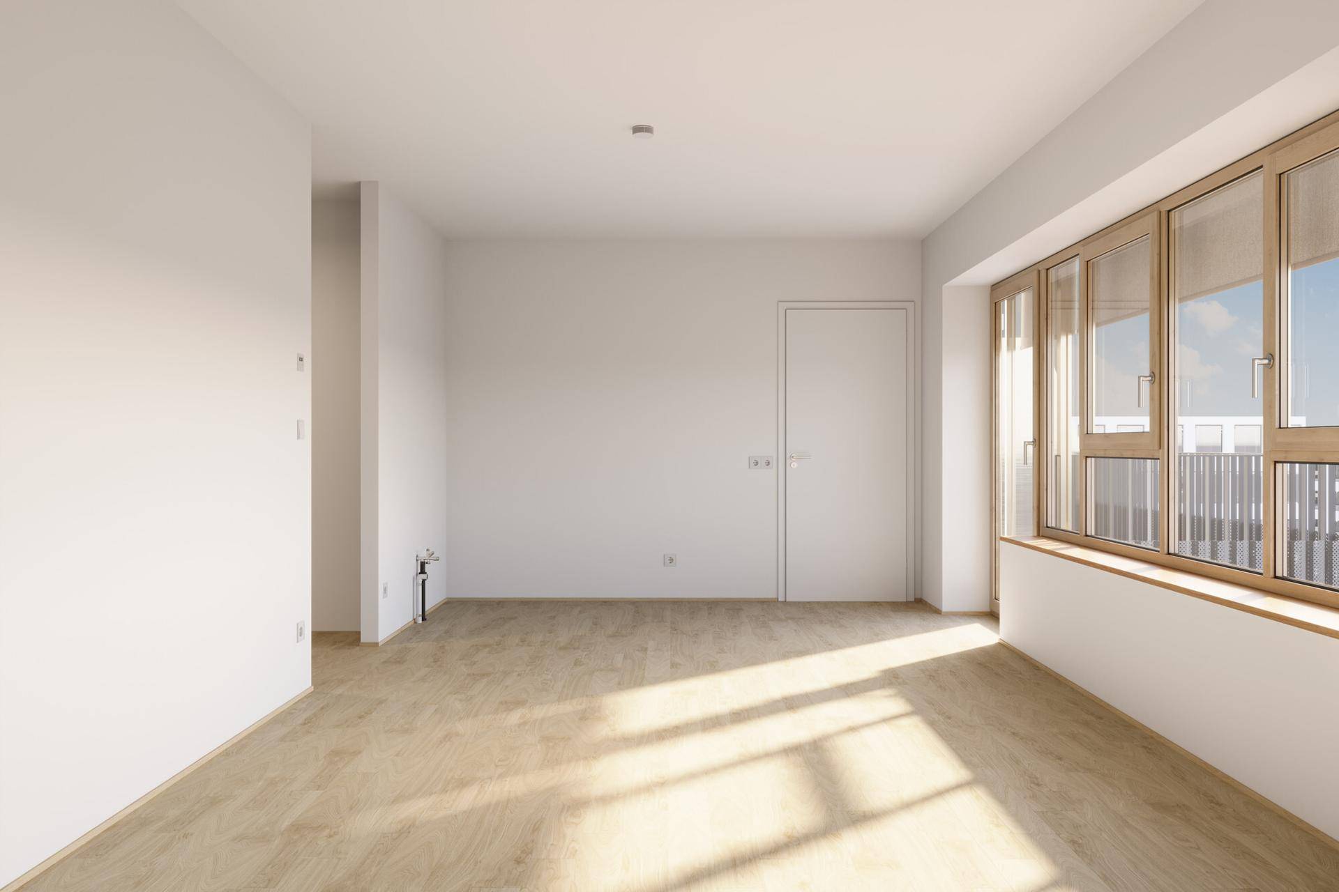 Geräumiger, heller Raum mit Holzboden und großen Fenstern, bereit für individuelle Gestaltung.