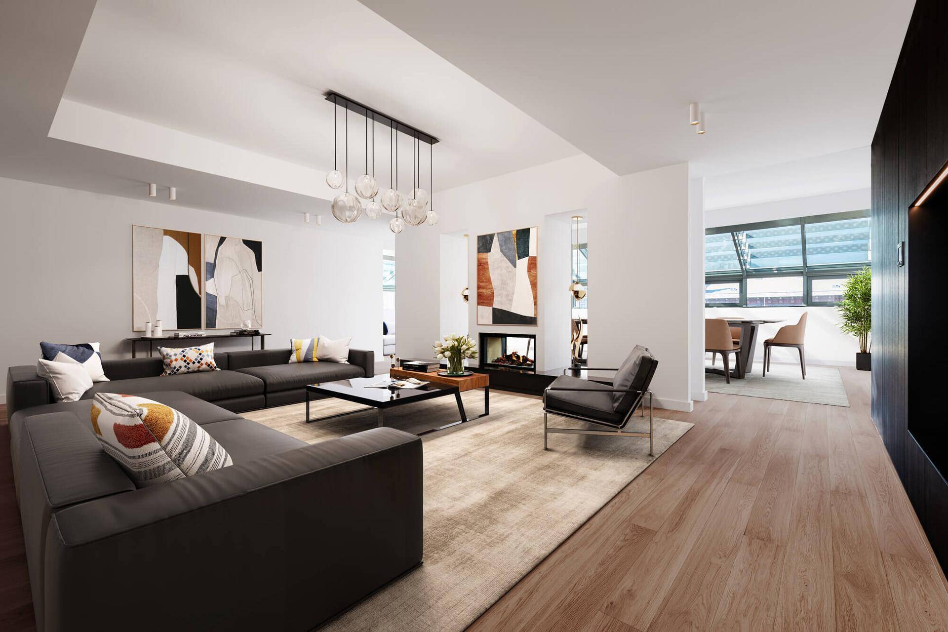 Großzügiger Wohn- und Essbereich mit modernem Sofa, Kamin und Holzboden, ideal für geselliges Beisammensein.