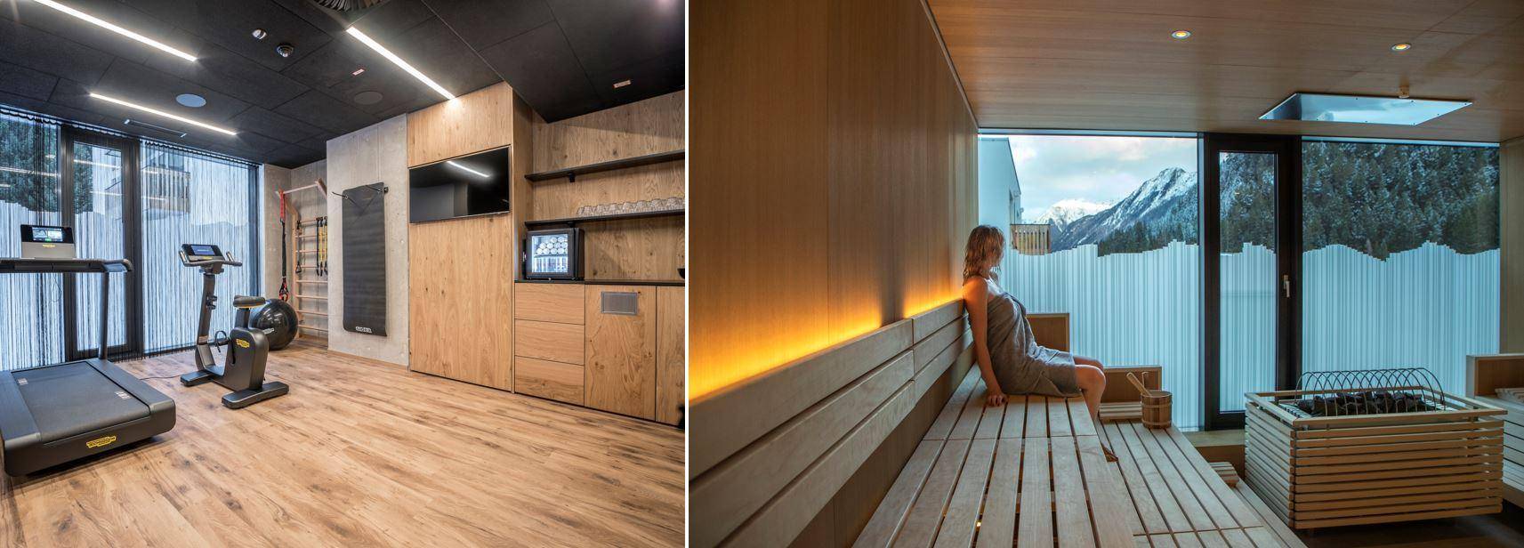 Fitnessraum mit Geräten und Wellnessbereich mit Sauna und Entspannungsliege.