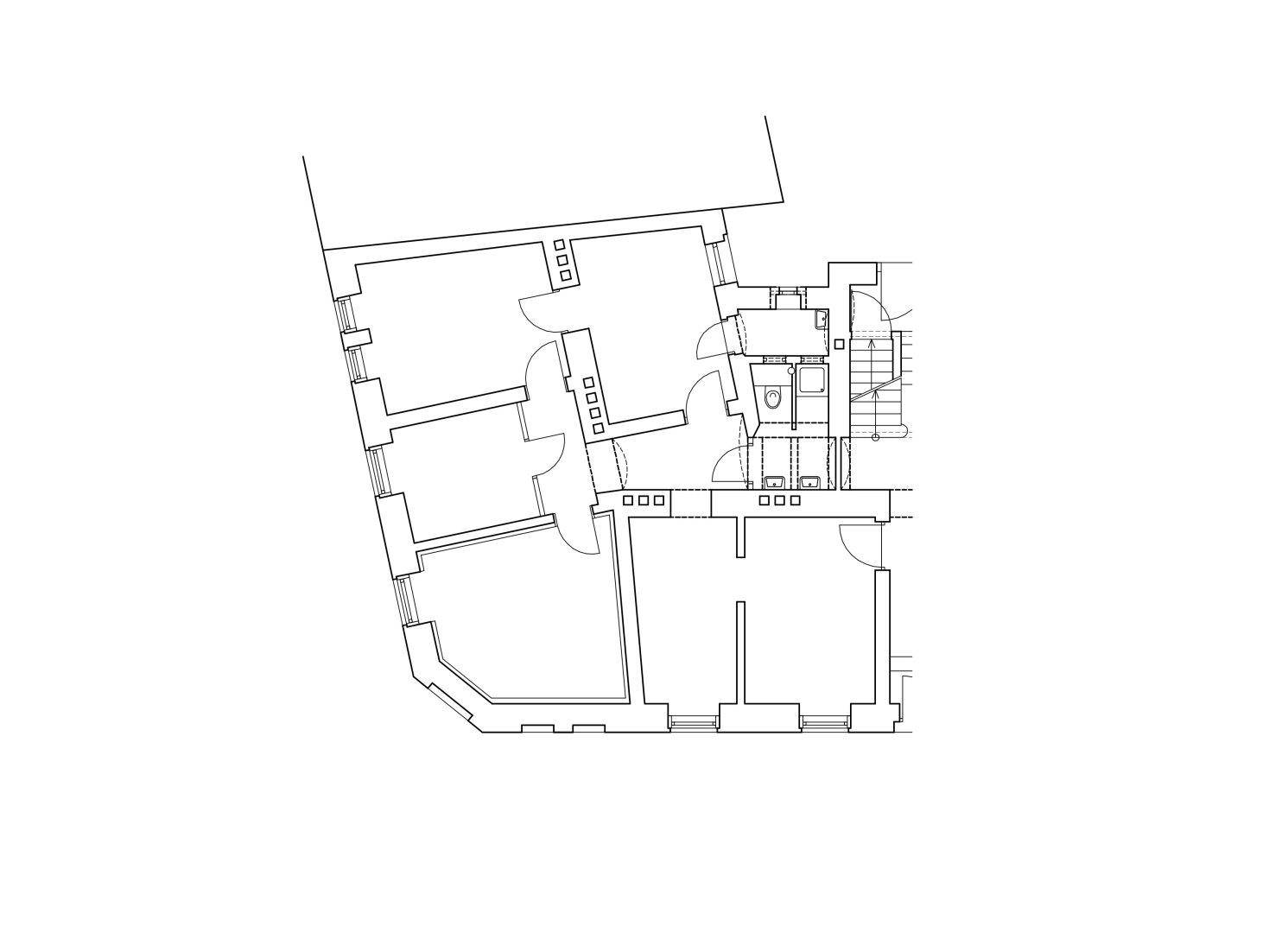 Grundriss einer Etage mit mehreren Räumen und einem Treppenhaus.