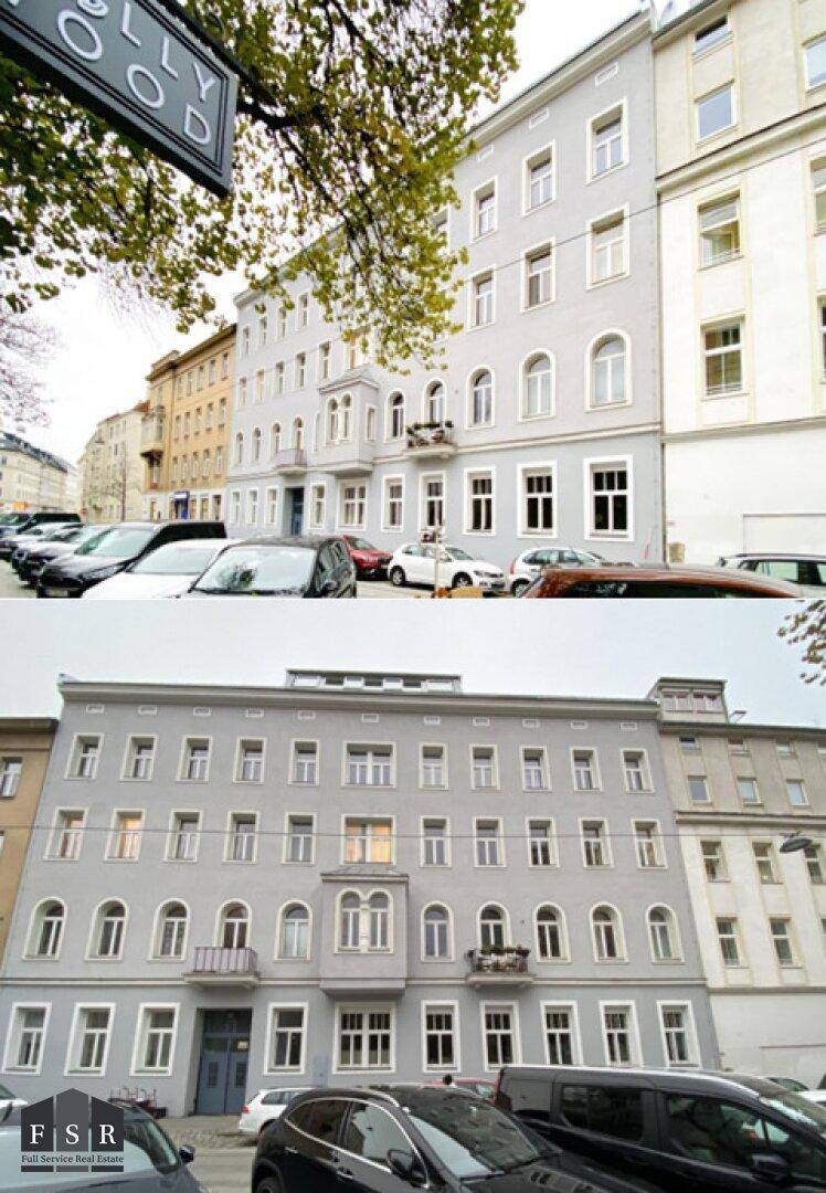 Mehrstöckiges Wohngebäude mit grauer Fassade und weißen Fenstern an einer belebten Straße mit parkenden Autos.