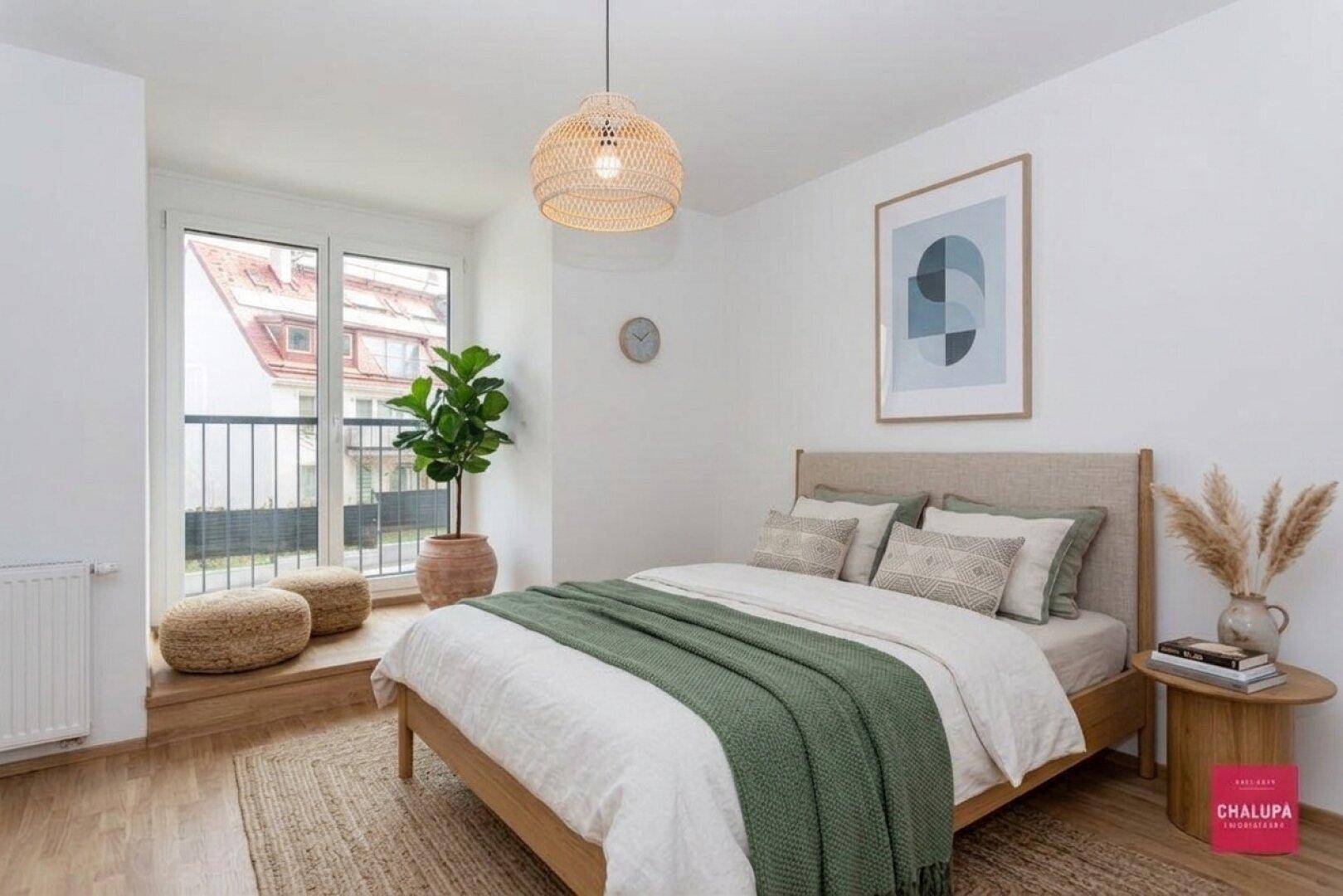 Gemütliches Schlafzimmer mit moderner Einrichtung, Parkettboden und französischem Balkon.