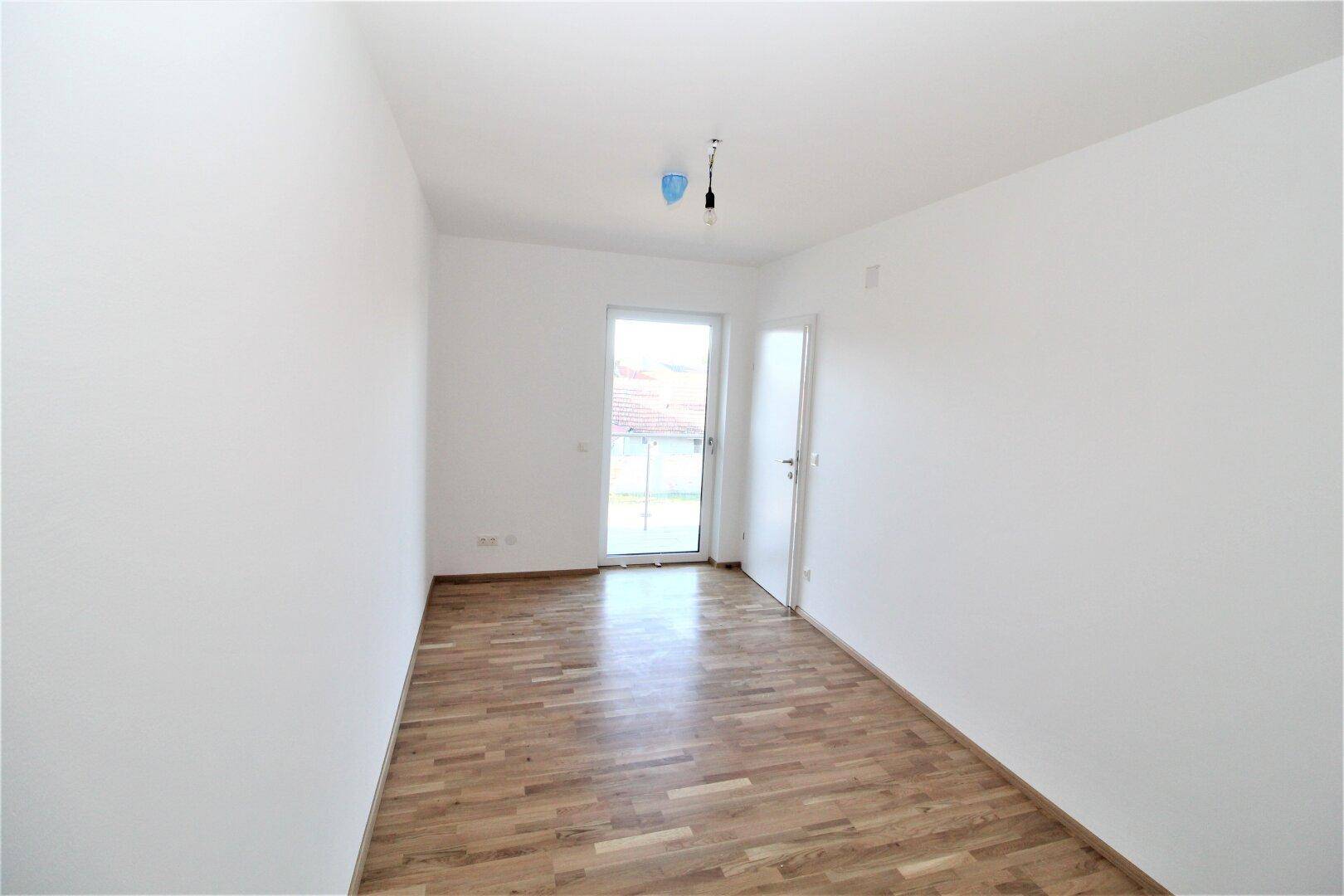 Zimmer mit Balkonausgang