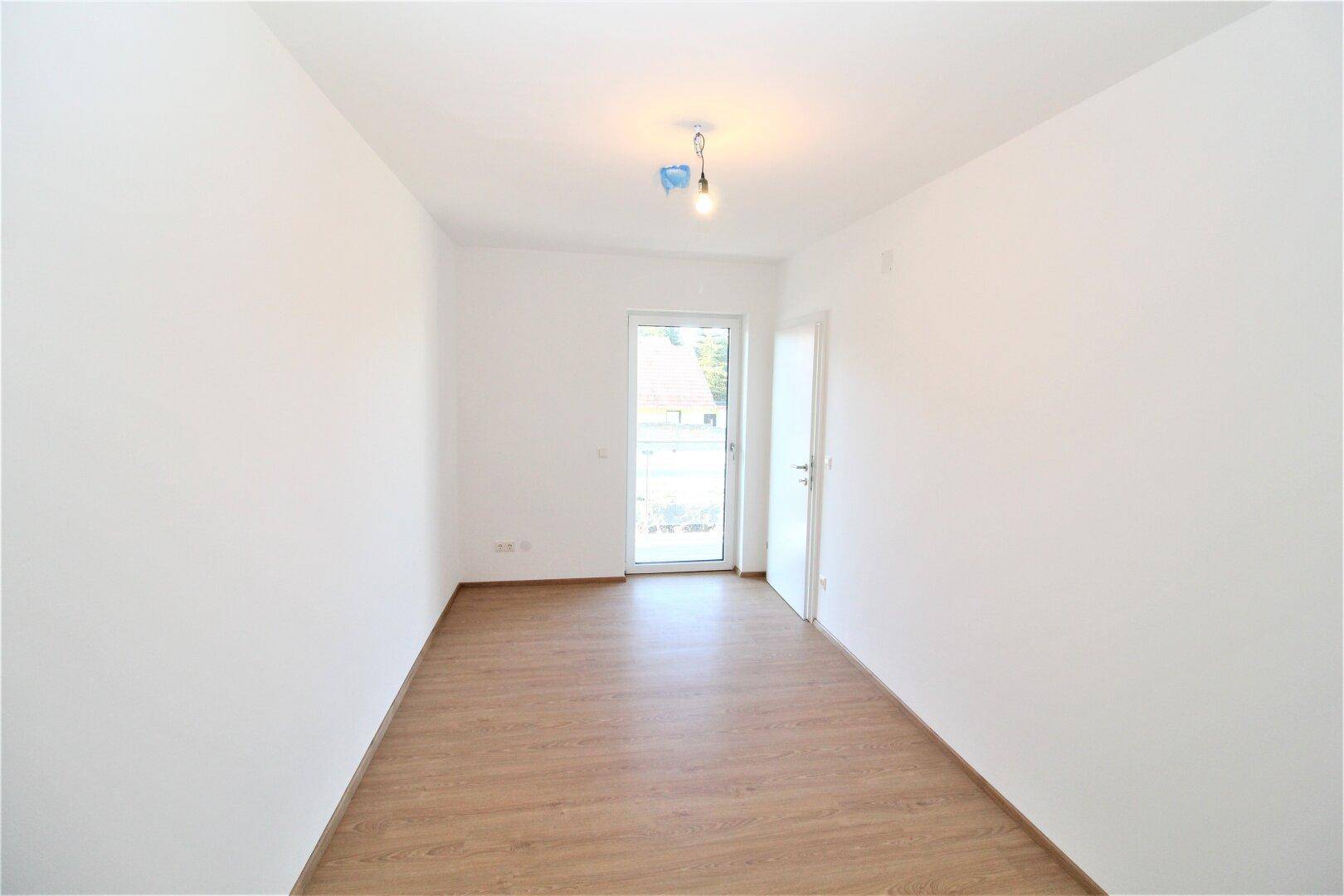 Zimmer mit Balkonausgang