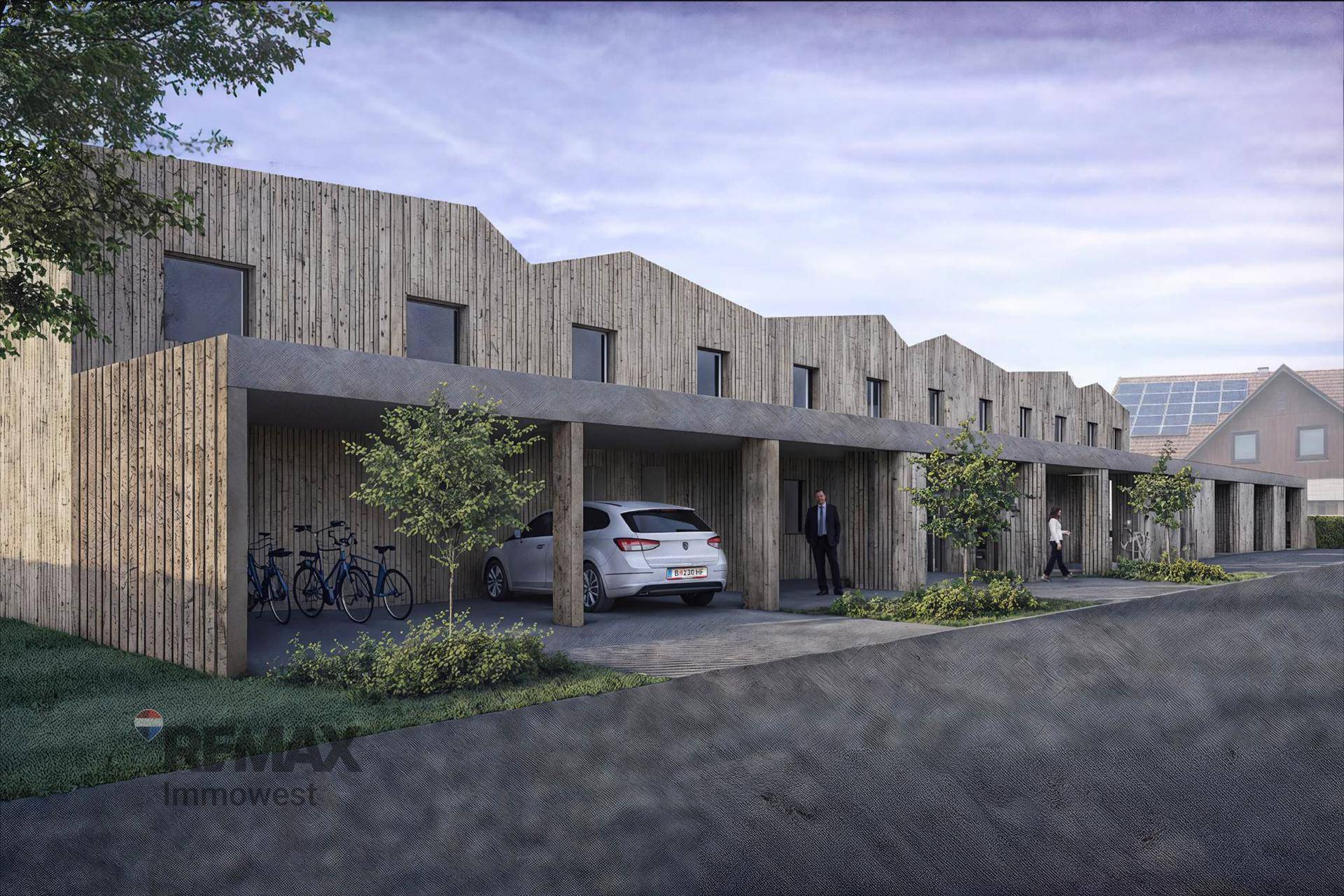 Visualisierung der modernen Reihenhäuser mit Holzfassade und überdachten Stellplätzen.