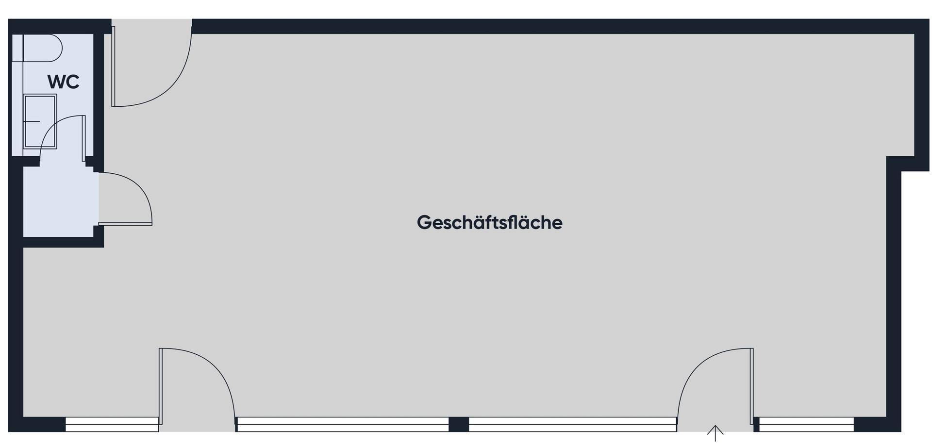 Grundriss der Geschäftsfläche mit einem separaten WC-Bereich und großen Fensterfronten.