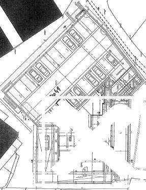 Detaillierter Lageplan mit eingezeichneten Parkplätzen und Gebäudestrukturen, der die Umgebung darstellt.