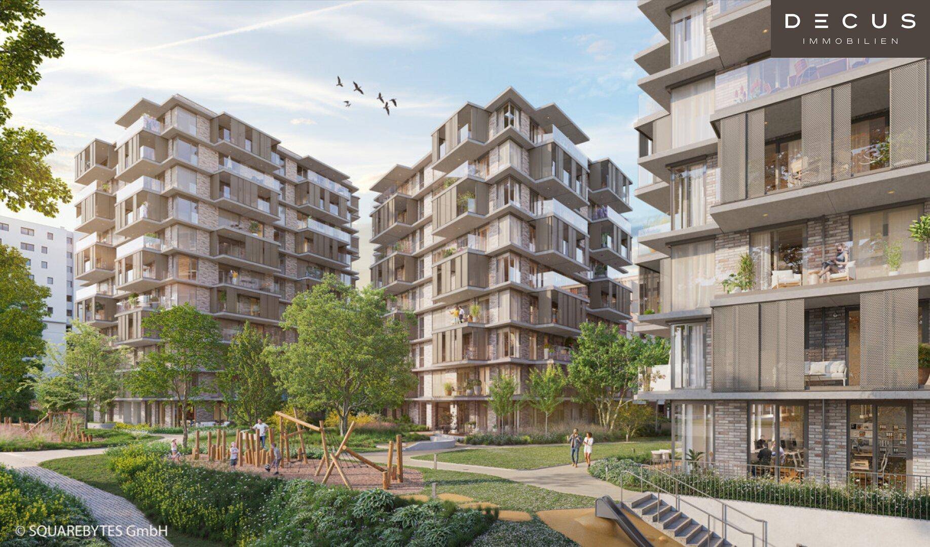 Ansicht eines modernen Wohnkomplexes mit Spielplatz und weitläufigen Grünflächen für Bewohner.