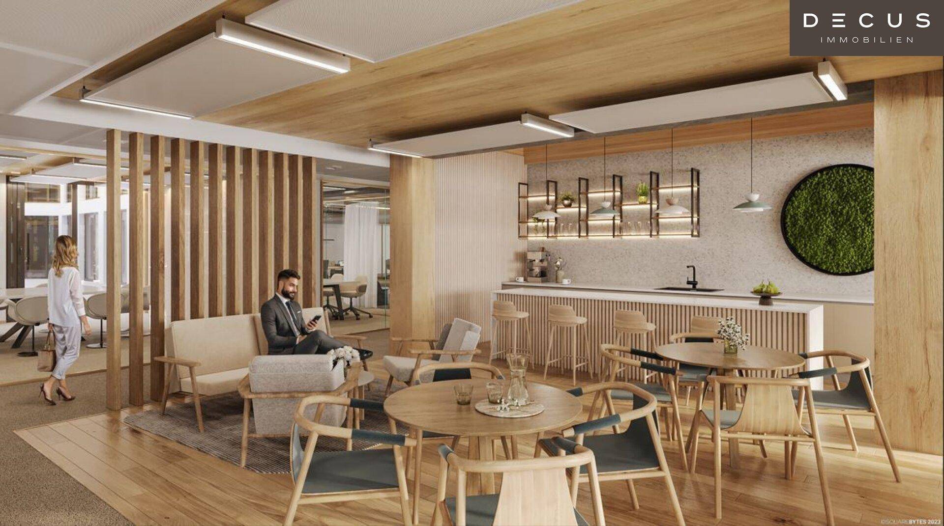 Moderne Büroküche mit Bartheke, Esstischen und einem gemütlichen Loungebereich für Pausen und Gespräche.