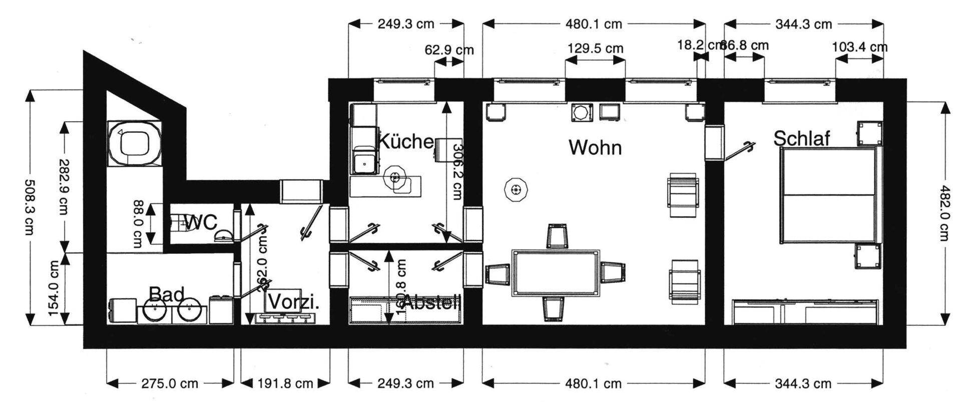 Grundriss einer Wohnung mit separater Küche, Wohn-Essbereich, Schlafzimmer, Bad und Gäste-WC. Ein Abstellraum ist ebenfalls vorhanden.