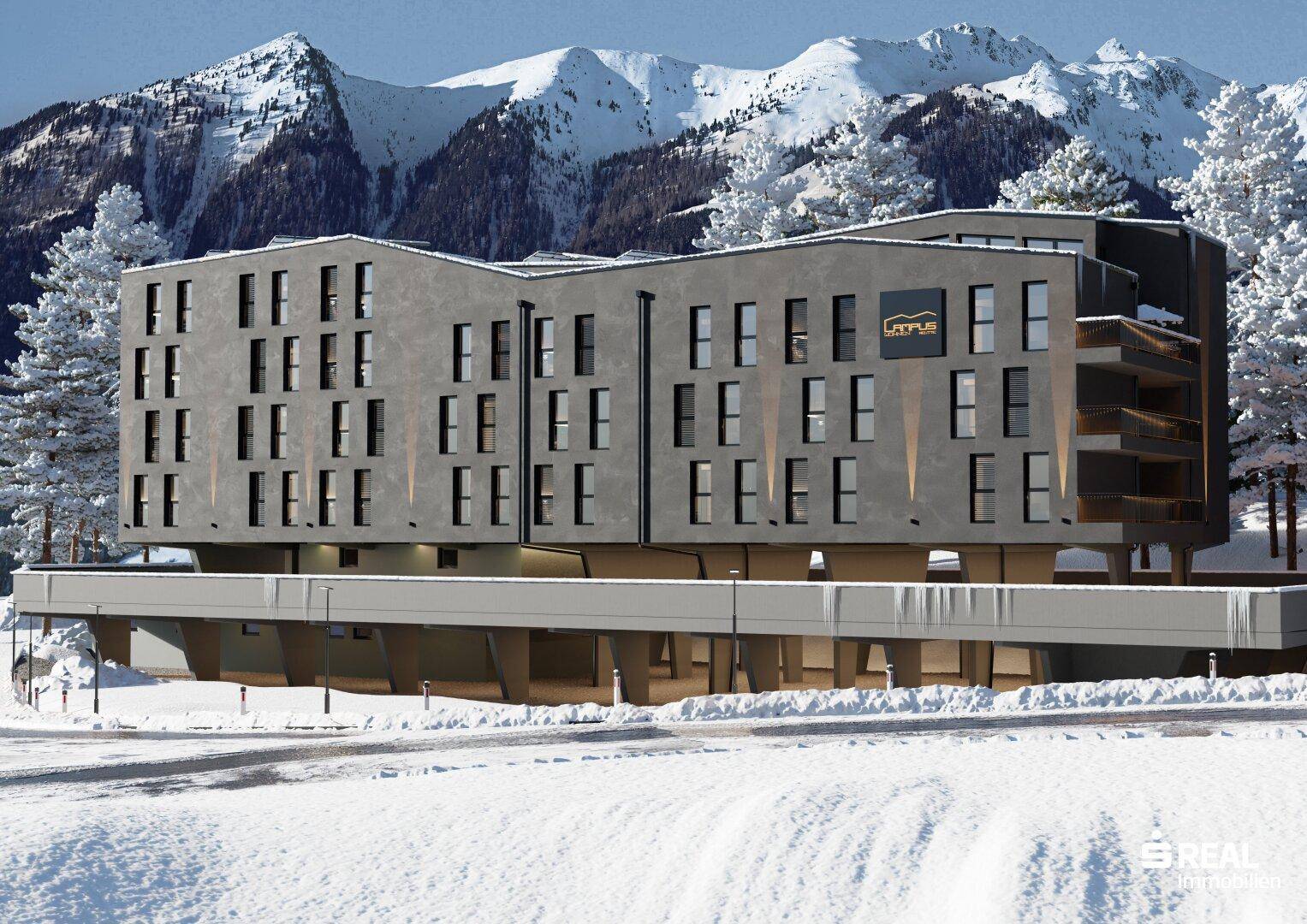Moderne Architektur eines Gebäudes in alpiner Winterlandschaft mit Bergblick.