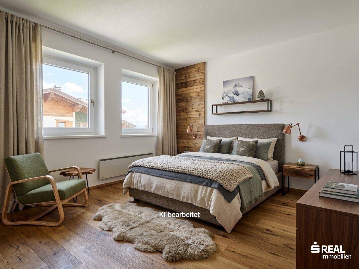 Schlafzimmer mit Holzwand, Doppelbett und Fenstern mit Bergblick.