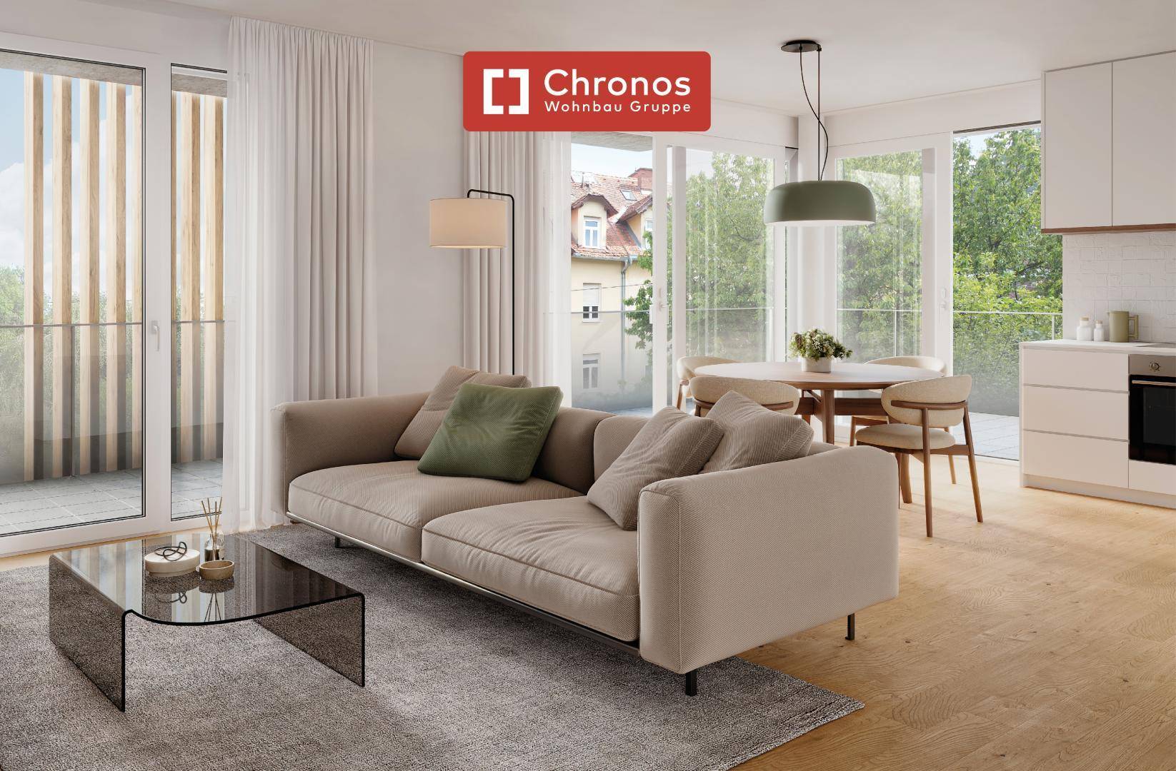 Moderner Wohnbereich mit beigem Sofa, Holzboden und integrierter offener Küche.