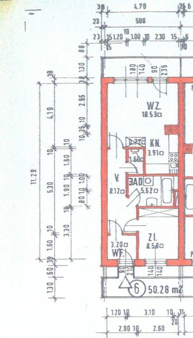 Detaillierter Grundriss mit Raumaufteilung und Bemaßungen für eine Wohnung.
