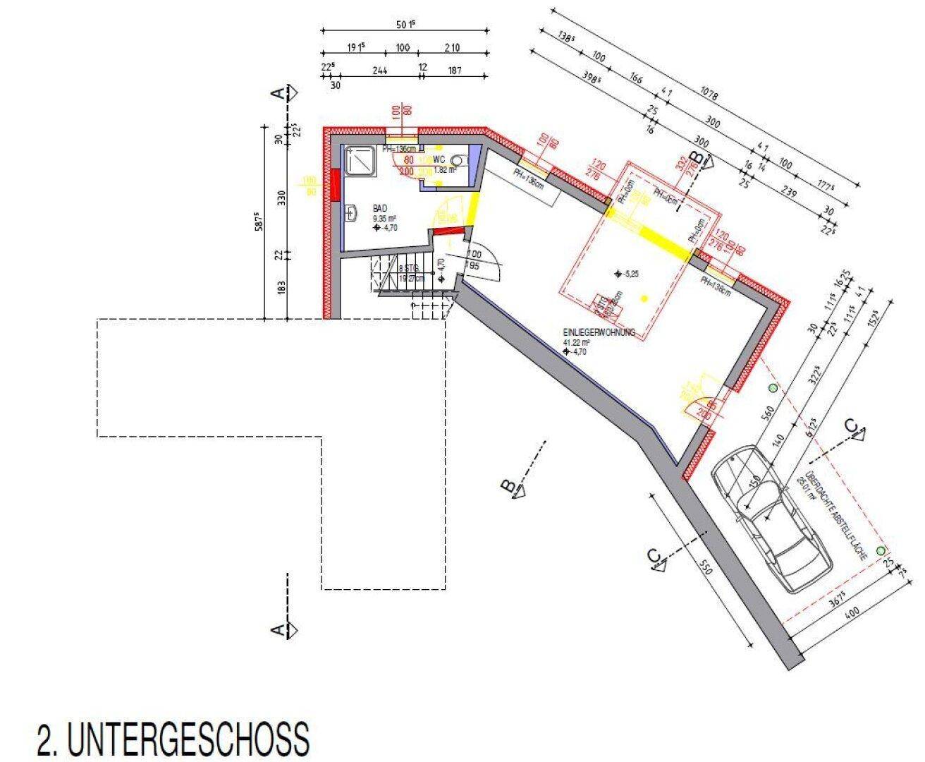Grundriss des zweiten Untergeschosses mit Badezimmer, Einliegerwohnung und überdachter Abstellfläche.