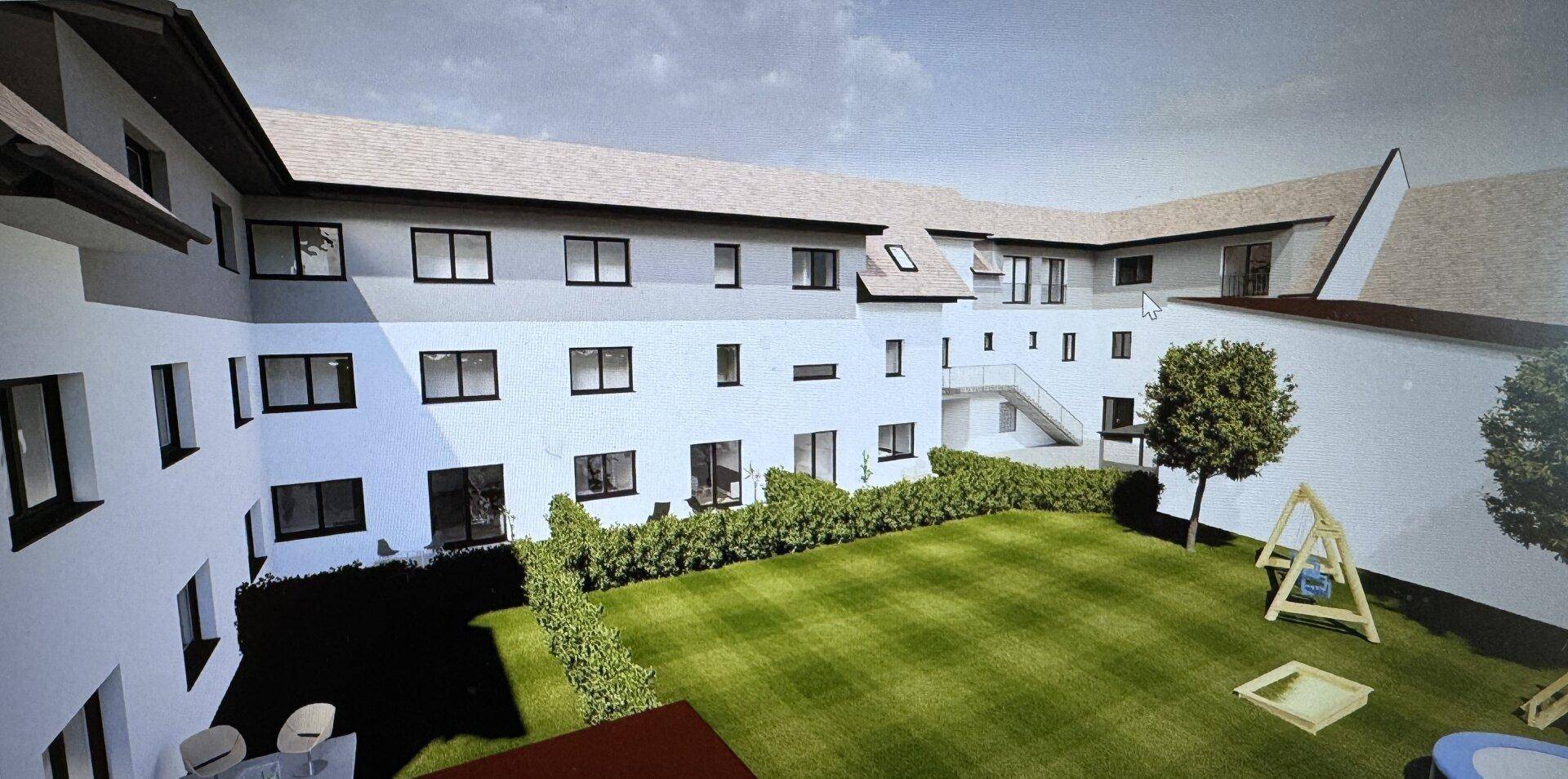 Visualisierung des Innenhofs mit gepflegtem Rasen, Hecke und Kinderspielplatz.