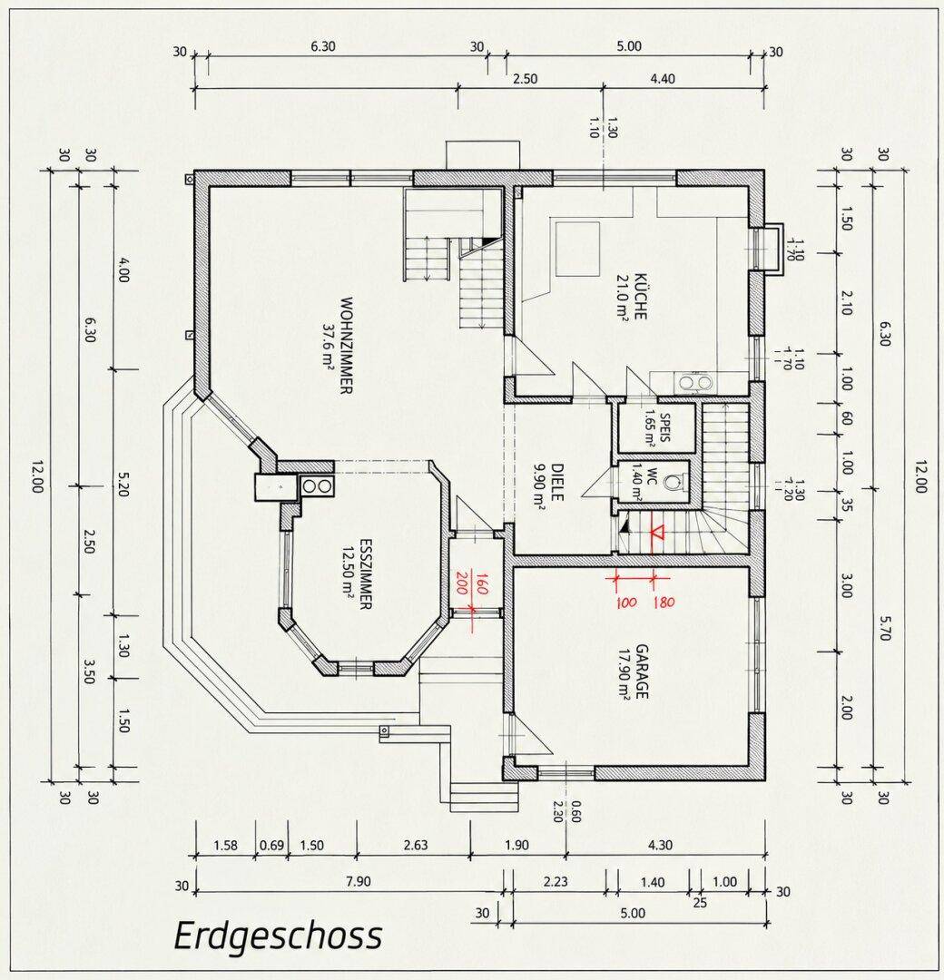 Grundriss des Erdgeschosses mit offenem Wohn-Essbereich, Küche und integrierter Garage.