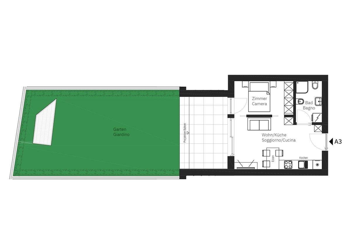 Grundriss einer Erdgeschosswohnung mit Schlafzimmer, Wohnküche und privatem Garten.