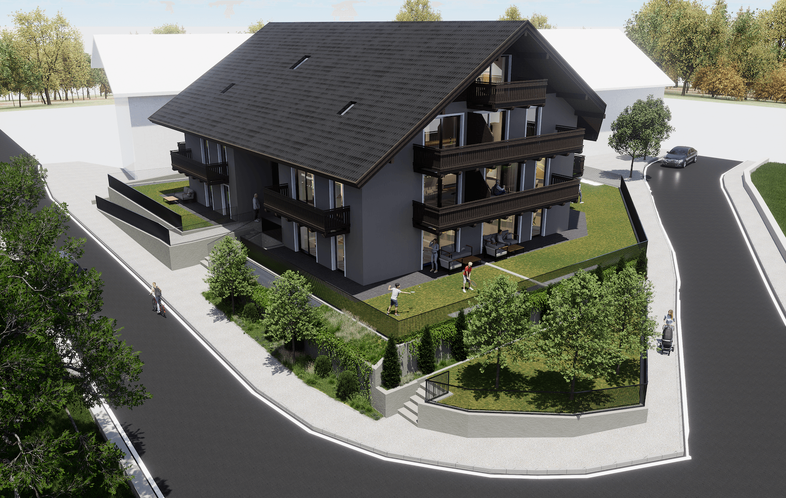 Luftaufnahme einer modernen Wohnanlage mit großzügigen Grünflächen und Balkonen.