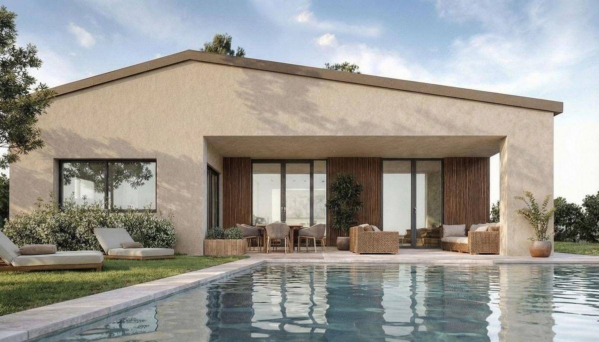 Elegante Villa mit großem Pool und einer einladenden Terrasse für entspannte Stunden im Freien.