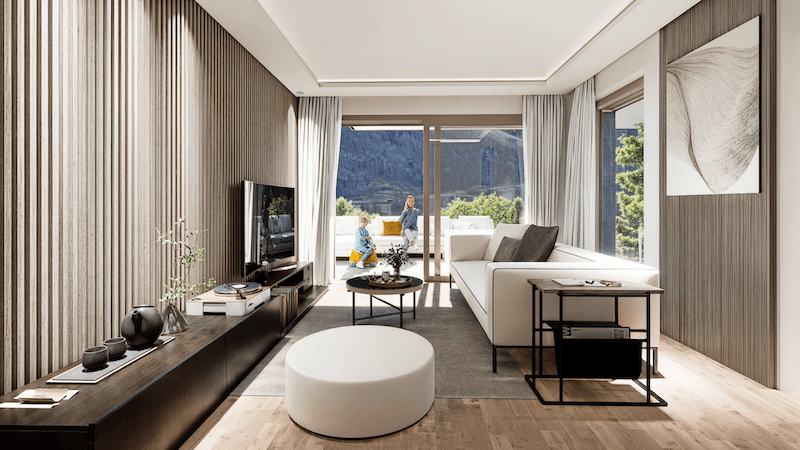 Stilvolles Wohnzimmer mit Holzwand, Parkettboden und Blick auf die umliegende Berglandschaft.