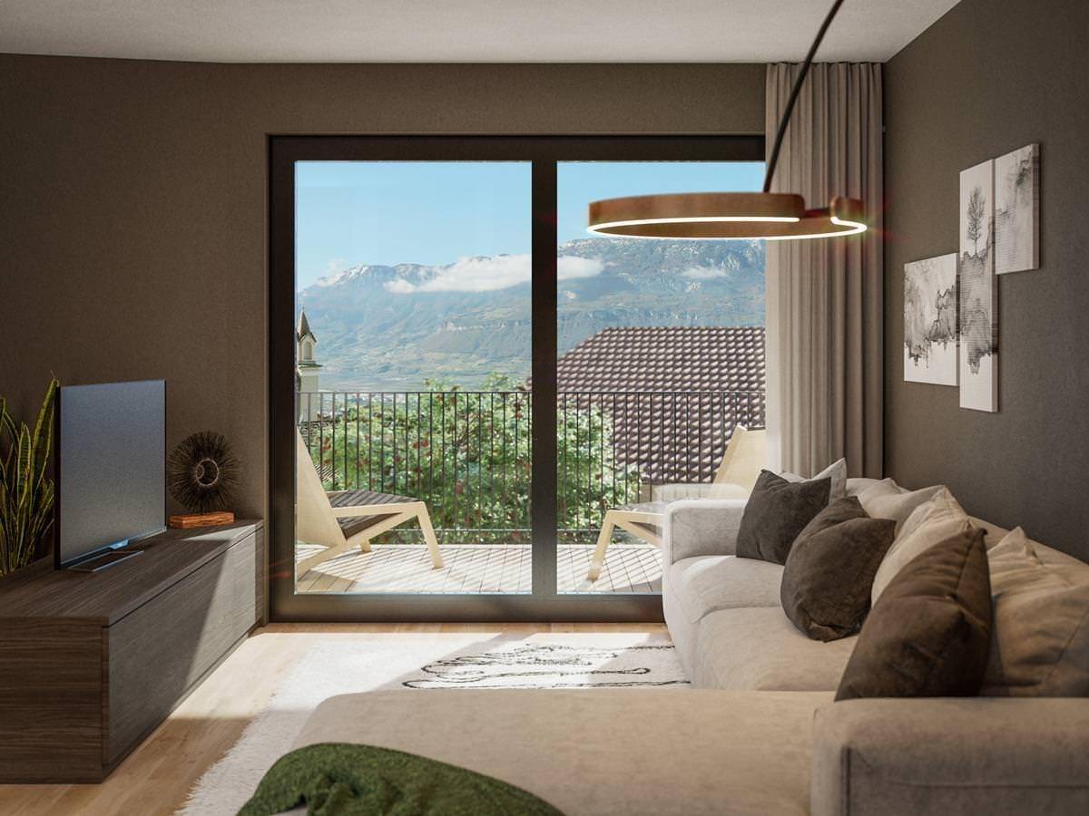 Modernes Wohnzimmer mit bequemer Couch, großem Fenster und direktem Zugang zum Balkon mit Bergblick.
