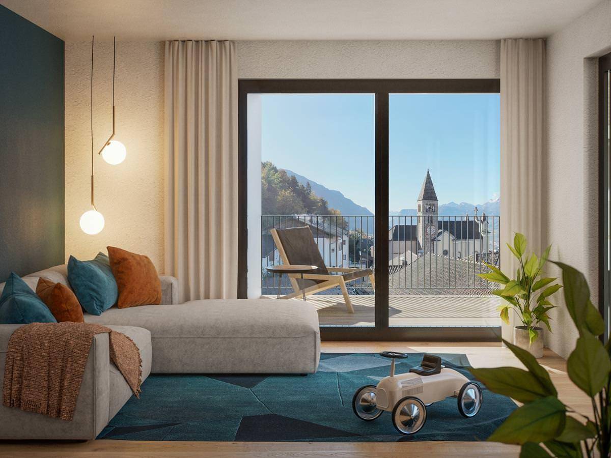 Helles Wohnzimmer mit Balkonzugang, Blick auf das Dorf und moderne Einrichtung mit farbigen Akzenten.