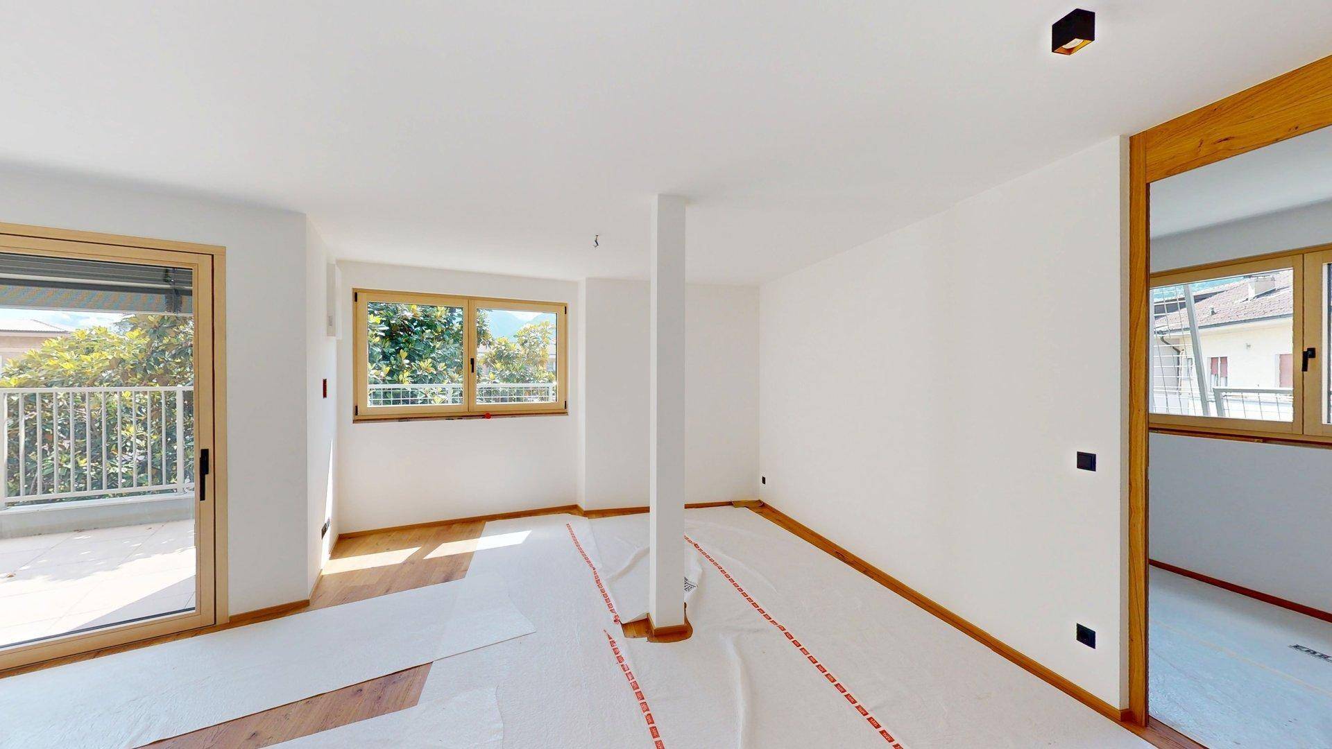 Meran-Merano-Penthouse-Dreizimmerwohnung-trilocale-Dachterrasse-terrazza-cantina-Keller-Aufzug-ascensore-Neubau