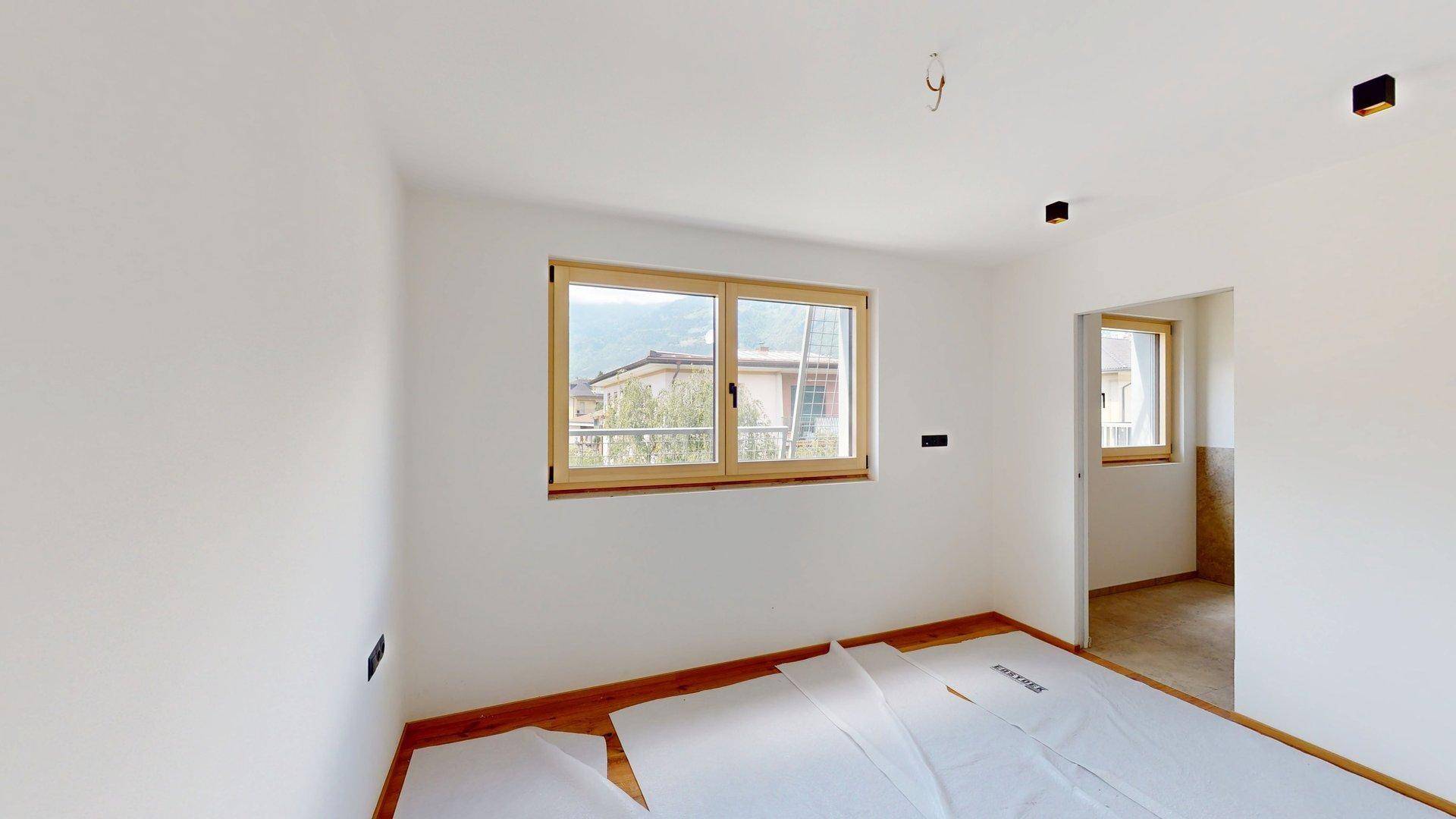 Meran-Merano-Penthouse-Dreizimmerwohnung-trilocale-Dachterrasse-terrazza-cantina-Keller-Aufzug-ascensore-Neubau