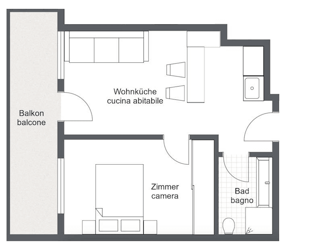 Grundriss einer Wohnung mit Balkon, Wohnküche, Schlafzimmer und Bad.