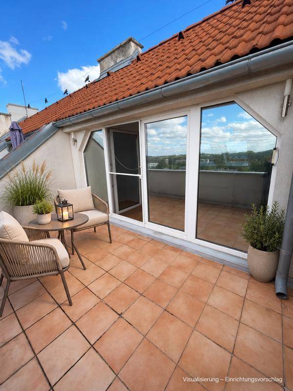 Kleine_Terrasse_mit_stilvoller_Sitzecke