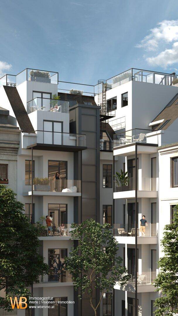 Moderne Balkone und Terrassen an der Rückseite des Gebäudes mit Glasgeländern und viel Grün.