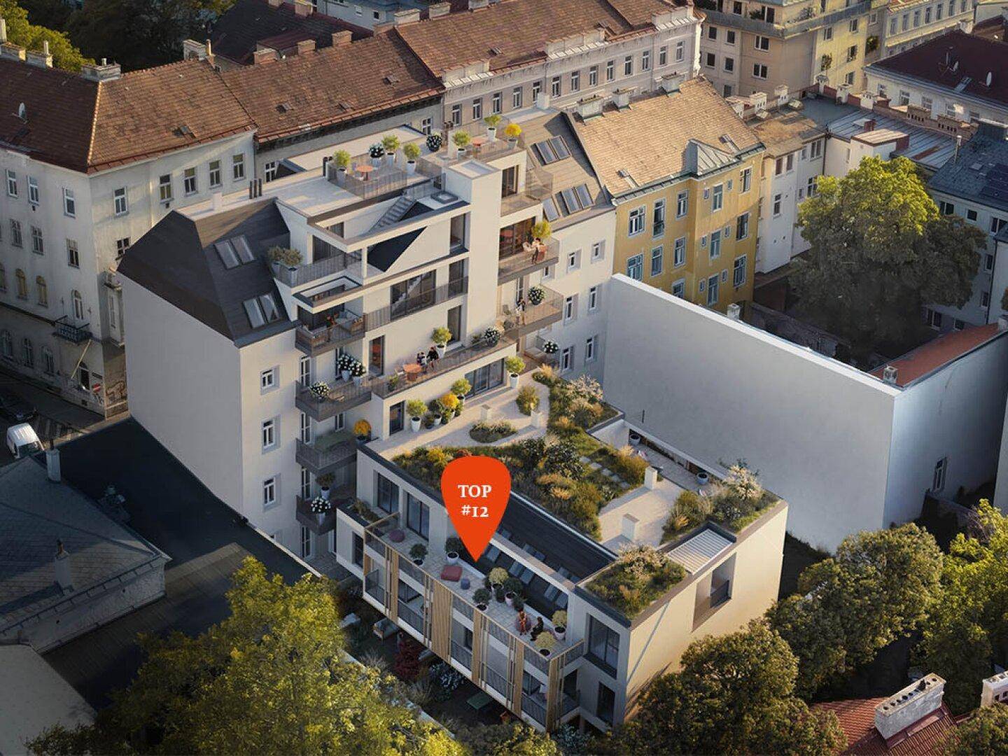 Moderne Wohnanlage mit begrünten Dächern und zahlreichen Balkonen in urbaner Umgebung.