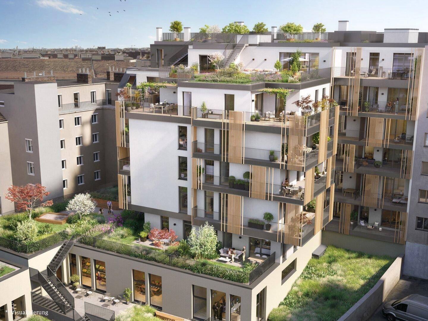 Moderne Wohnanlage mit gestuften Terrassen, vertikaler Begrünung und ansprechender Fassadengestaltung.