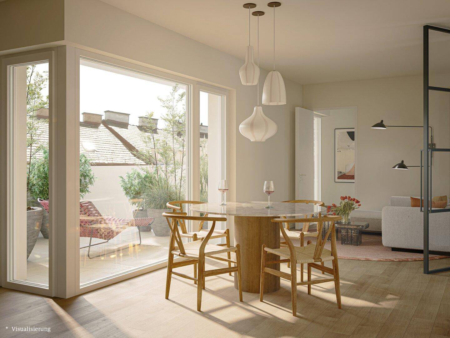 Heller Essbereich mit Holzboden, modernem Esstisch und direktem Zugang zur sonnigen Terrasse.