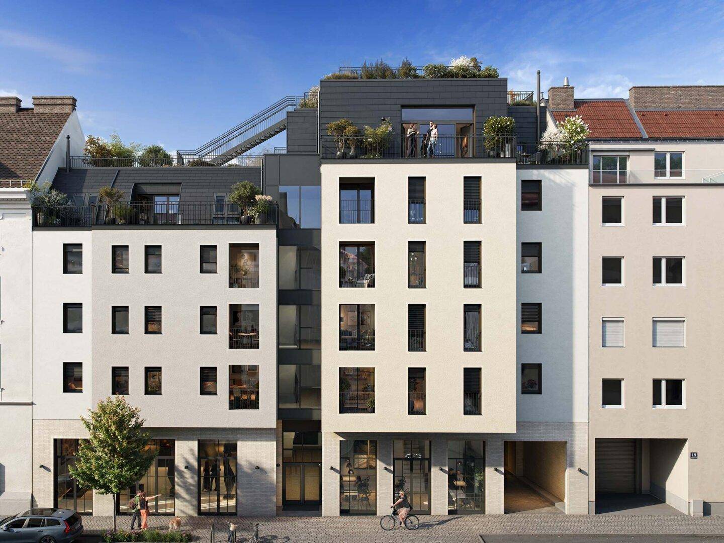 Moderne Stadtfassade mit großen Fenstern und Dachterrassen in urbaner Umgebung.