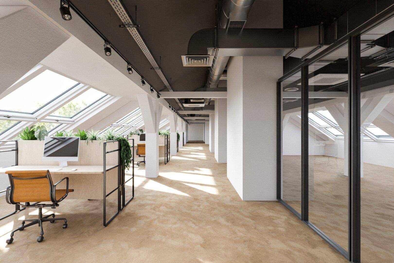 Geräumiger Großraumbürobereich mit vielen Dachfenstern, modernen Arbeitsplätzen und freiliegenden Lüftungssystemen.