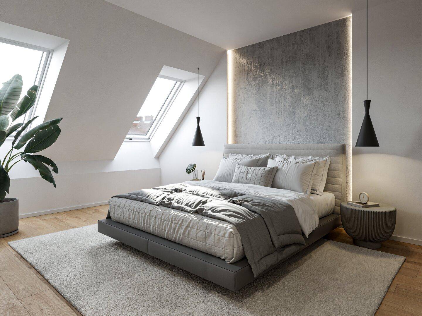 Modernes Schlafzimmer mit Holzboden, Akzentwand aus Beton und viel Tageslicht durch Dachfenster.