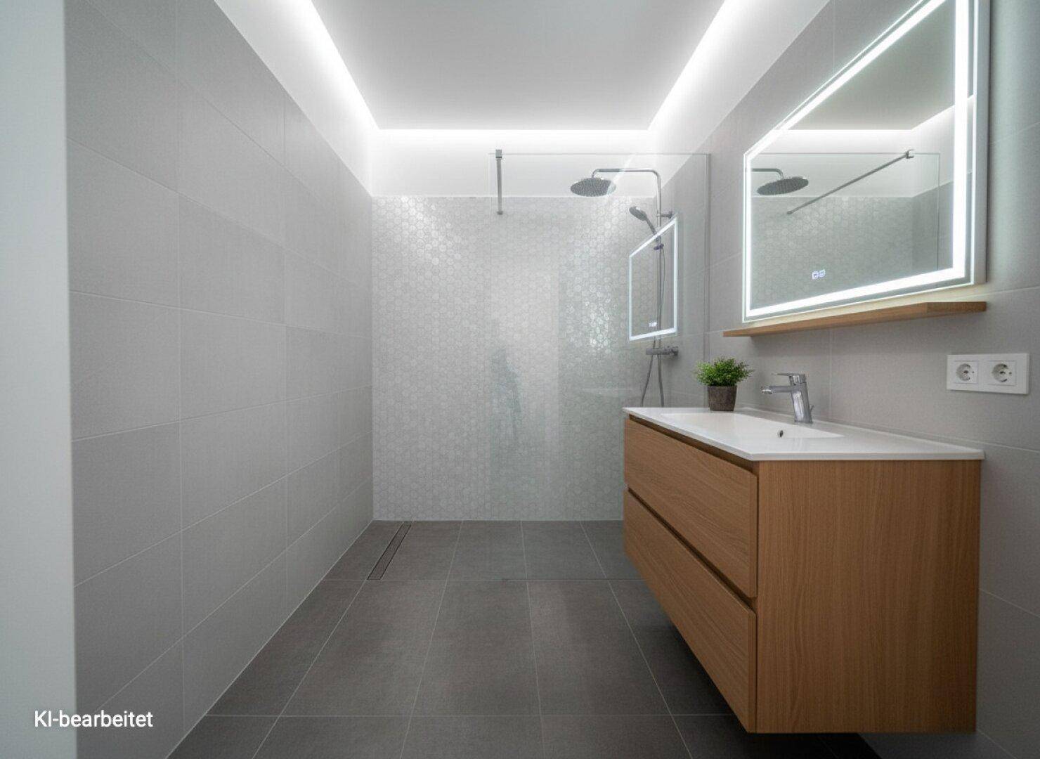Modernes Badezimmer mit großer begehbarer Dusche, Holzwaschtisch und beleuchtetem Spiegel.